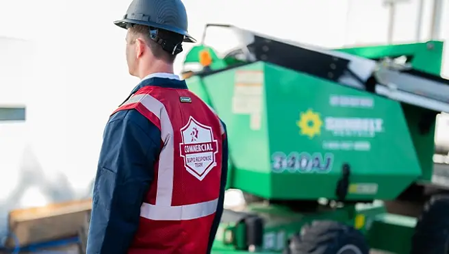 Rainbow Restoration’s emergency response team works outdoors, deploying equipment in Perry Hall, MD.