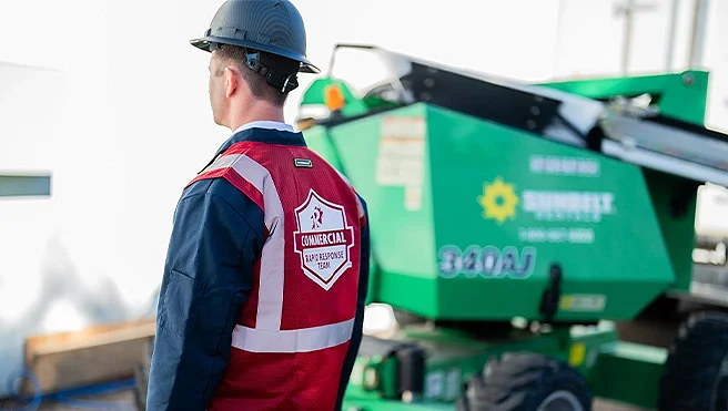 Rainbow Restoration’s emergency response team works outdoors, deploying equipment in Grottoes, VA.