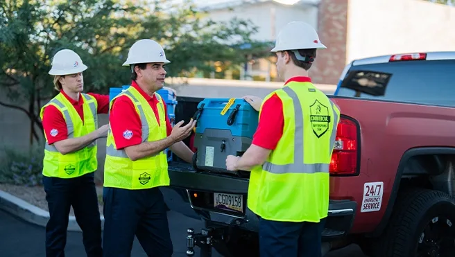 Rainbow Restoration’s emergency response team unloads equipment at a property damage loss in Modesto, CA.