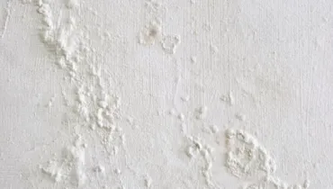 Water damage on causing bumpy wall